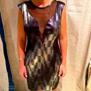 This is a sexy cocktail dress by Nikki Becky